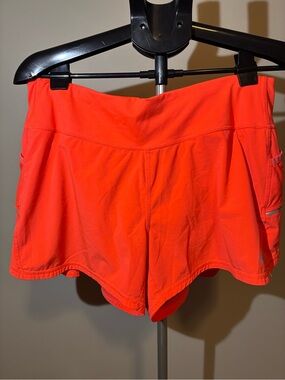 Athleta Neon Orange Athletic Shorts